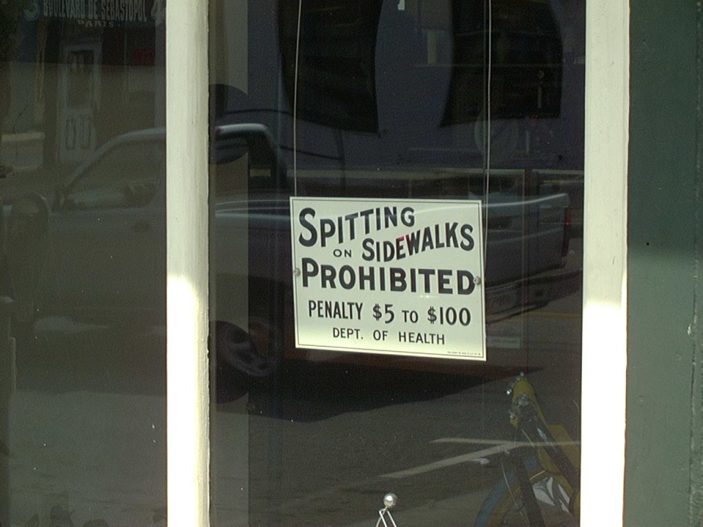 Spitting on the sidewalks prohibited by law
