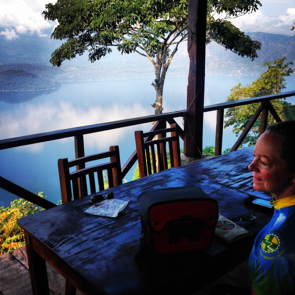 Janet enjoying the view over Coatepeque Caldera from the restaurant at the Coffee Finca.