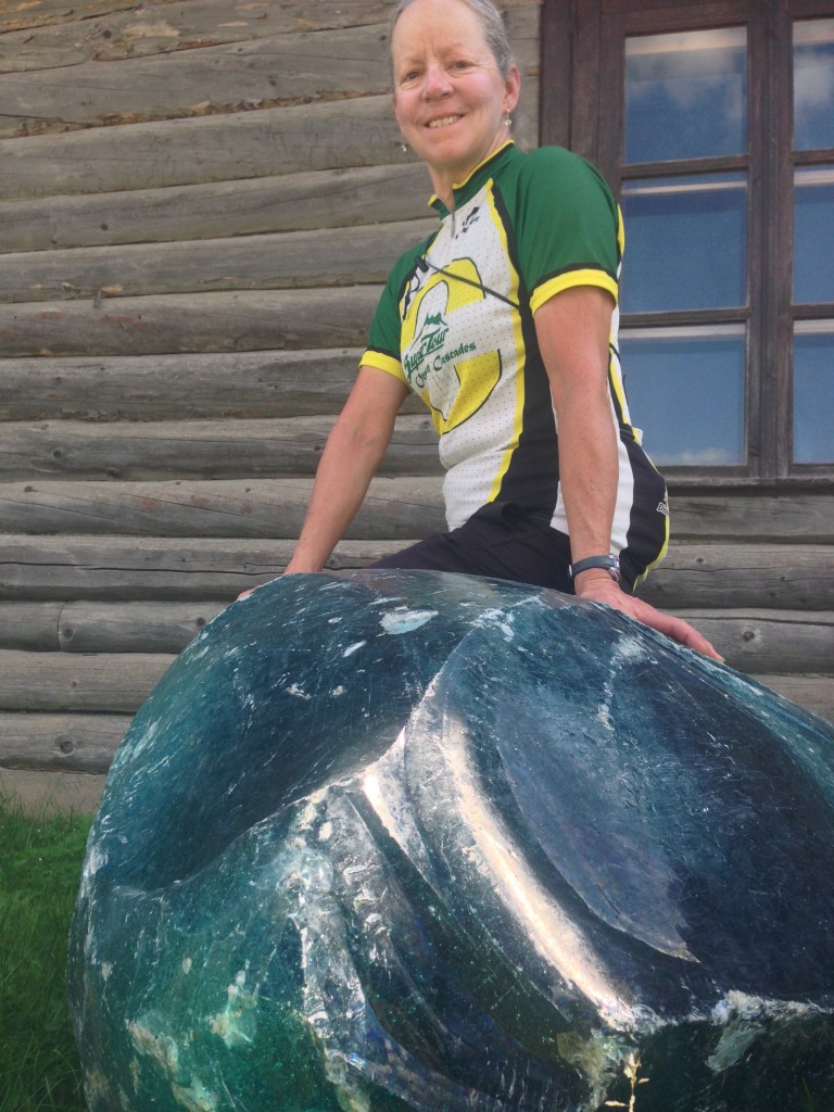 Janet sitting atop a piece of glass at the Jarvakandi glass museum