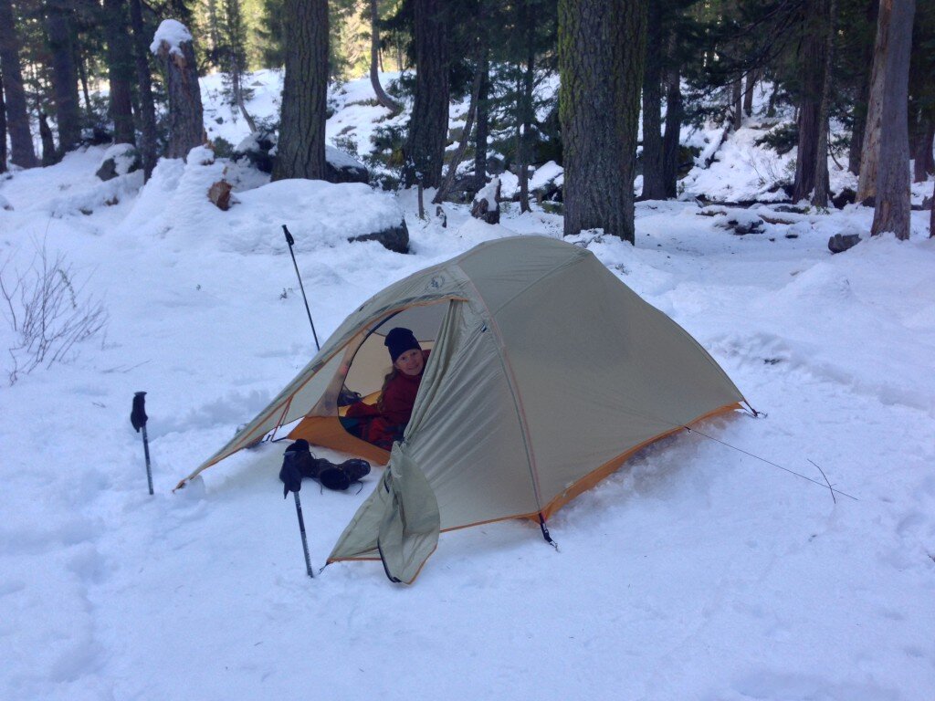 Snow Camping isn't too bad if it is cold enough. Just pack down the snow firmly, and it won't melt, and you have a level sleeping surface.