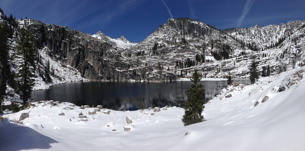 Upper Canyon Creek Lake with Thompson peak and Wedding cake in the background
