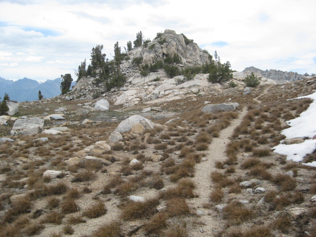 The Trail is still good just below Kennedy Pass on the North side.