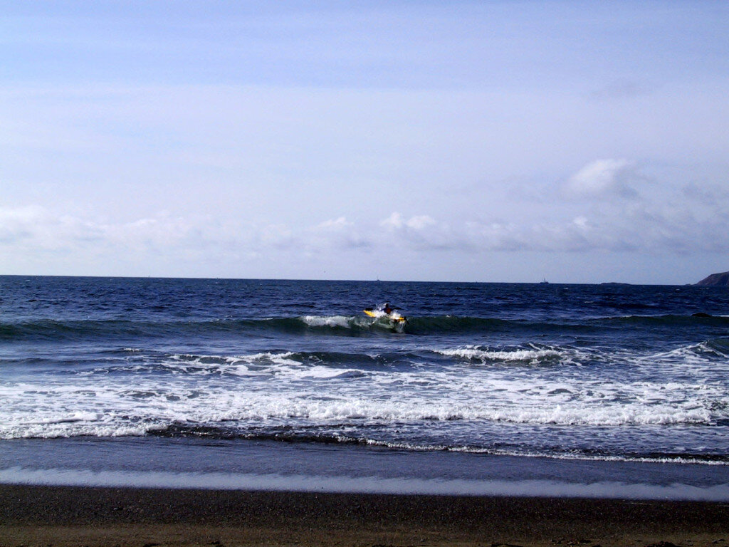 Playing in the waves at Estero Americano