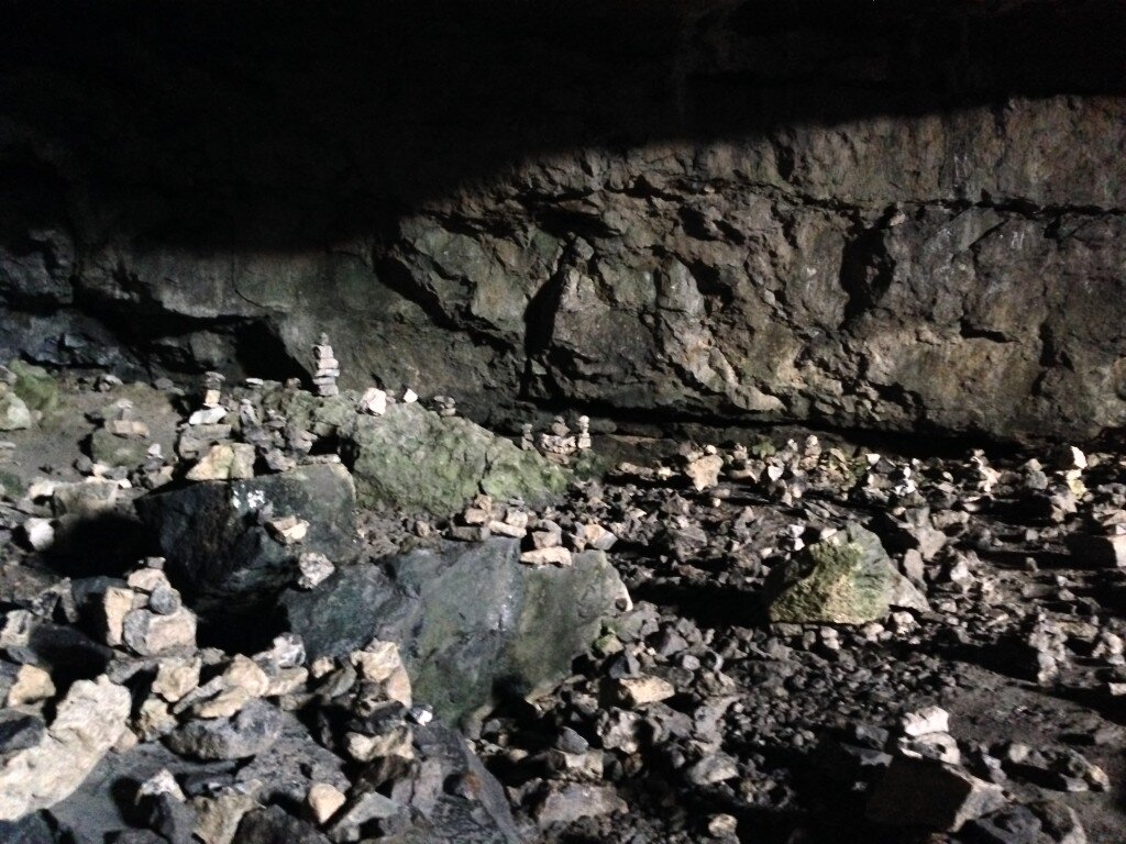 A number of cairns in this section; it is the first cave you will come to if you take the cable car - and the last if you hike up from the bottom.
