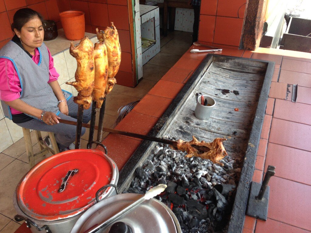 Cuy being roasted. A very tasty alternative to chicken. 