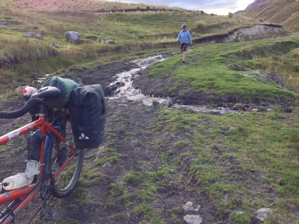 In the muddy sections, Janet would sometimes walk while I push-rode the bike... downhill.
