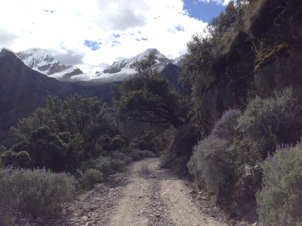Looking back up the mountains after a bumpy descent (bring your suspension bike!)
